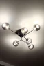   
                        Люстра WUNDERLICHT (Німеччина) 25312    
                         у стилі хай-тек.  
                        Тип джерела світла: cвітлодіодні led, енергозберігаючі, розжарювання.                         Форма: коло, молекула.                         Кольори плафонів і підвісок: срібло.                         Матеріал: скло.                          фото 2