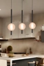   
                        
                        Люстра LAGUNA LIGHTING (Україна) 35238    
                         У стилі Хай-тек.  
                        Тип джерела світла: вбудований led-модуль, незмінний.                         Форма: Куля.                         Кольори плафонів і підвісок: Прозорий, Чорний, Золото.                         Матеріал: Скло.                          фото 3