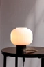   
                        
                        Настольная лампа NORDLUX (Дания) 51266    
                         в стиле Модерн.  
                        Тип источника света: светодиодная лампа, сменная.                                                 Цвета плафонов и подвесок: Белый.                         Материал: Стекло.                          фото 4