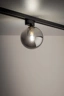   
                        
                        Трековий світильник TK LIGHTING (Польща) 57296    
                         у стилі Хай-тек.  
                        Тип джерела світла: світлодіодна лампа, змінна.                                                 Кольори плафонів і підвісок: Сірий.                         Матеріал: Скло.                          фото 2