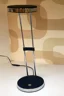   
                        
                        Настольная лампа EGLO (Австрия) 64164    
                         в стиле Хай-тек.  
                        Тип источника света: встроенный led-модуль, несъемный.                                                 Цвета плафонов и подвесок: Серый, Черный.                         Материал: Сталь, Пластик.                          фото 2
