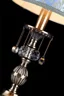  
                        
                        Настольная лампа MAYTONI (Германия) 74630    
                         в стиле Классика.  
                        Тип источника света: светодиодная лампа, сменная.                                                 Цвета плафонов и подвесок: Голубой, Рисунок, Прозрачный.                         Материал: Ткань, Хрусталь.                          фото 2